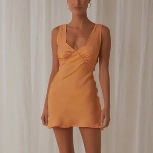 Peppermayo marigold mini dress! The material is gorgeous and has a shimmer to it
